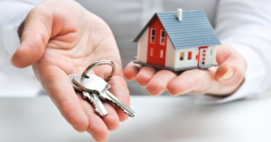 What First-Time Homebuyers Need to Know Right Now - hand reaching out with keys